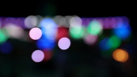 Moving carousel ride with defocused colorful lights Stock Footage 120138328