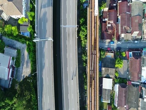 Moving cars, motorcycles and train as view from above. Видео 80541253