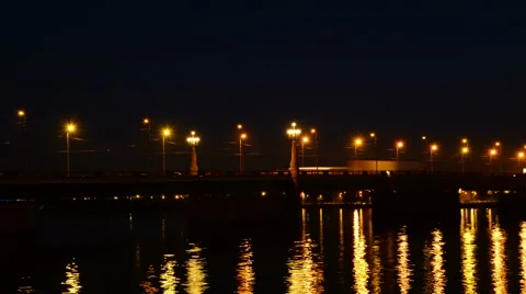 Moving cars on the stone bridge at night Stock Footage 59169826