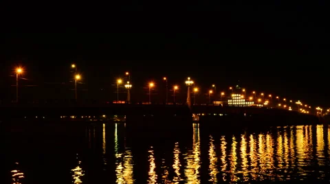 Moving cars on the stone bridge at night Stock Footage 59180310