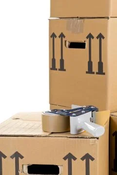 Moving carton boxes stack with tape roller Stockfoto's
