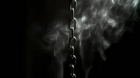 Moving chain on a black background Stock Footage 12152600