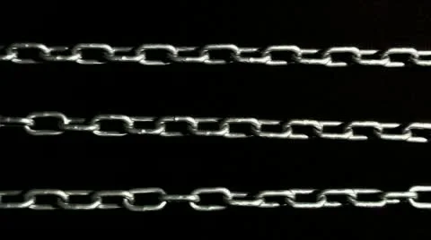 Moving chain on a black background Stock Footage 12152614