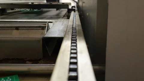 Moving chain on industrial machine Stock Footage 295783686