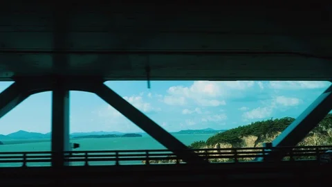Moving cityscape scenery seen through the windows of a vehicle at Seoul Stock Footage 120586961