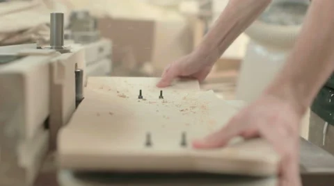 Moving close-up look at man working with wood Stock Footage 58304230