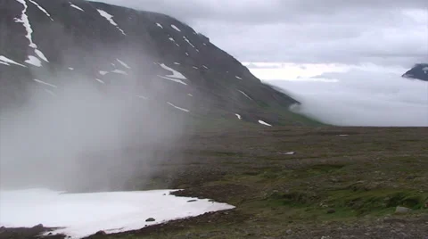 Moving cloud incoming into glacial valley with fog Stock Footage 37269792