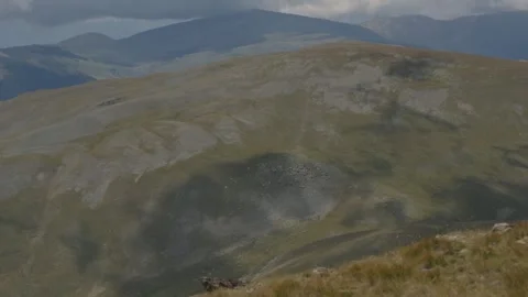 Moving cloud landscape in high mountains Stock Footage 297792448