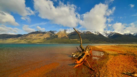 Moving Cloud Over Lake And Mountain Video stock 36480287