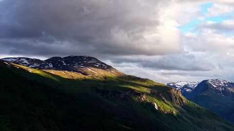 Moving Cloud Shadows Over Green Mountain Slopes in Dramatic Norwegian Landscape Stock Footage 340121951