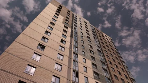 Moving clouds above modern high rise residential building in time lapse Видео 342610757