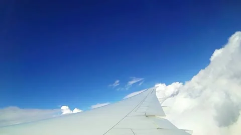 Moving clouds, airplain in the sky Stock Footage 22227001