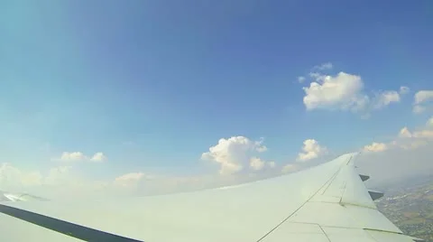 Moving clouds, airplain in the sky Stock Footage 22231823
