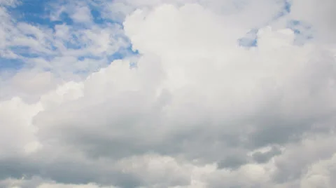 Moving clouds and blue sky time lapse Stock Footage 23509155