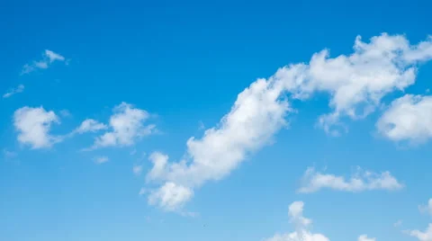 Moving clouds and blue sky - time lapse_4K Stock Footage 64326023