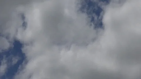 Moving Clouds and Blue Sky -  Time Lapse speed 100x Stock Footage 71763309