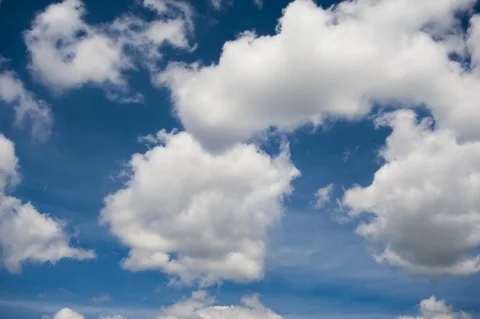 Moving clouds and blue sky time lapse Stock Footage 76477548