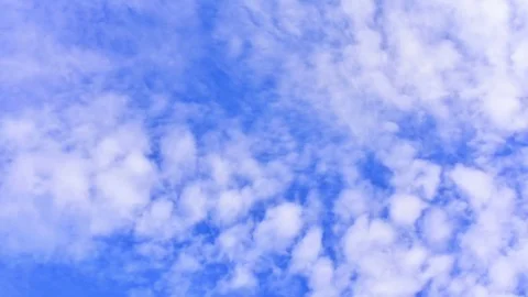 Moving clouds and blue sky. Time lapse. Stock Footage 77414497