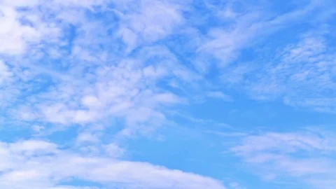 Moving clouds and blue sky. Time lapse. Stock Footage 77414548