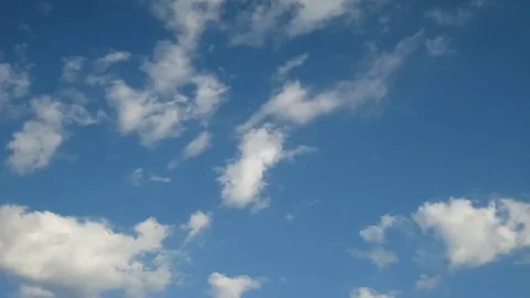 Moving clouds and blue sky time lapse Stock Footage 77802950