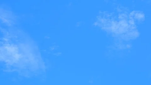 Moving clouds and blue sky time lapses Stock Footage 98967844
