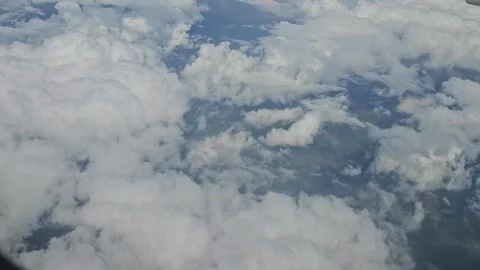 Moving Clouds and Landscape Below During Flight Over Argentina Stock Footage 341035933