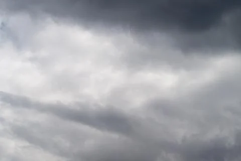 Moving clouds and light create lively scene. Shifting cloud patterns combined 写真素材