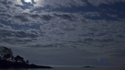 Moving Clouds and Moonshine Over Bay Stock Footage 71812692