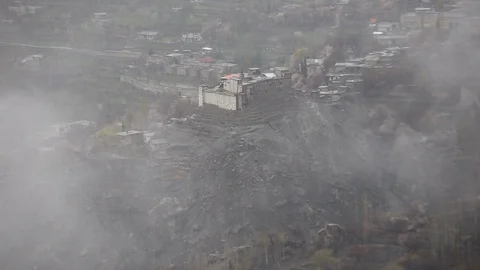 Moving Clouds and Rains over the Hunza Stockbeeldmateriaal 115575819
