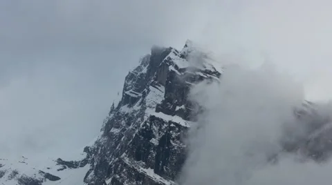 Moving clouds around snow mountain peak. Time lapse Stock-Footage 41854243