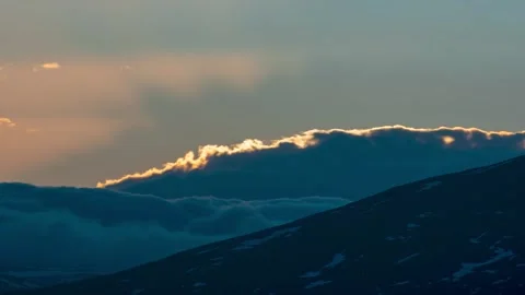 Moving clouds with the backlight of the midnight sun  in Abisko, Northern Sweden Stock Footage 295384958