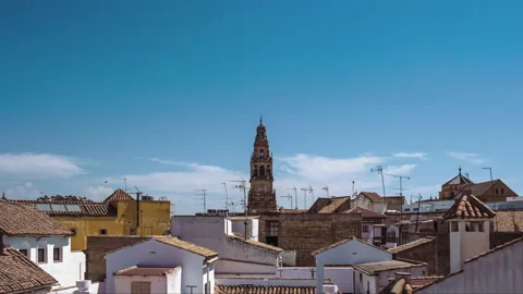 Moving Clouds Behind Bell Tower Of Mosque-Cathedral Of Cordoba - Time Lapse Vídeo Stock 146244010
