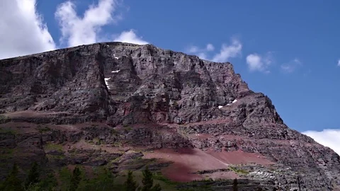 Moving Clouds Behind Mountain in Glacier National Park Vídeos de archivo 72327429