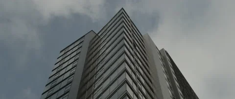 Moving clouds behind a skyscraper Stockbeeldmateriaal 135471716