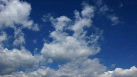 Moving clouds in a blue sky Stock Footage 380127