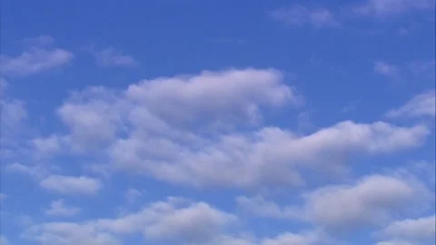 Moving clouds in blue sky Stock Footage 310952506