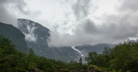 Moving clouds in Bondhusdalen valley  Stock Footage 37825624