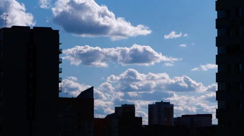 Moving clouds in the city, timelapse Stock Footage 51618707