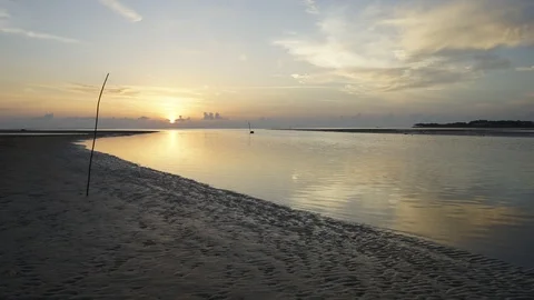 Moving clouds during sunset on the beach Stock Footage 94113045