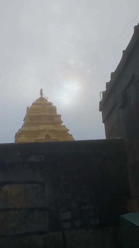 Moving Clouds Hiding Sun Over Temple on Rainy Day Stock Footage 328562283