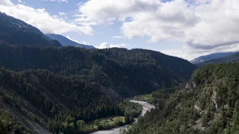 Moving clouds on a mountain scenery with the river rhine, timelapse, Switzerland Video stock 163141577