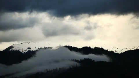 Moving clouds in mountains in winter Stock Footage 227501781