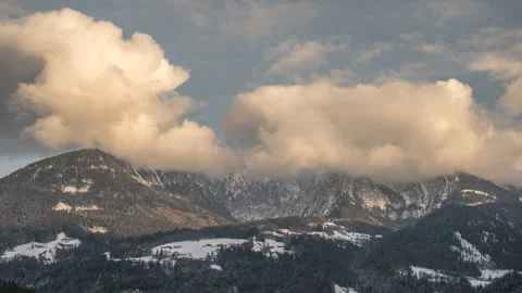 Moving clouds on mountaintop Stock Footage 168014626