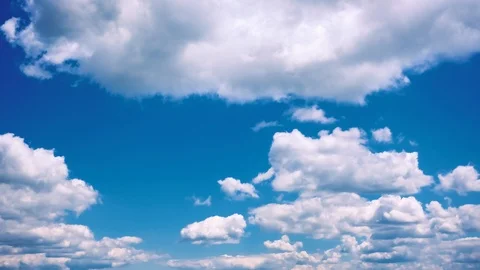 Moving clouds over blue sky time lapse video Stock Footage 93296739