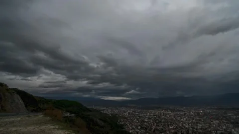 Moving clouds over the city Stock Footage 322945134