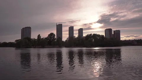 Moving Clouds Over City Lake. 4K UHD Footage. Stock Footage 241542555