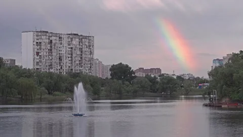 Moving Clouds Over City Lake. 4K UHD Footage. Stock Footage 241542743