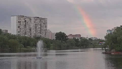 Moving Clouds Over City Lake. 4K UHD Time-lapse. Stock Footage 241542860