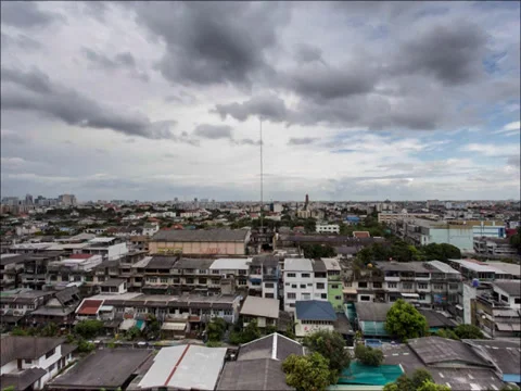 Moving Clouds over cityscape timelapse Stock Footage 36245761