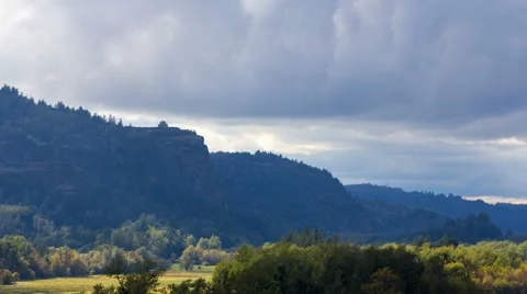 Moving clouds over Crown Point along Columbia Gorge in Oregon 4k time lapse uhd Stock Footage 67731647